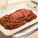 Guida su Cotechino: Origine, Ingredienti e Ricette